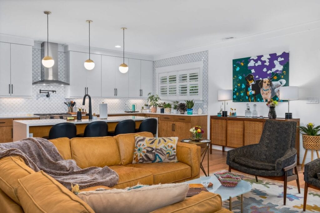 Stylish open-concept living room and kitchen space for family comfort.