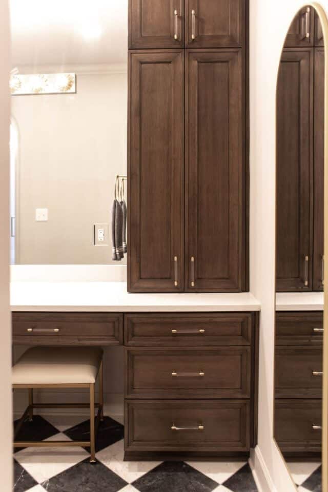 Elegant bathroom cabinetry with mirror in Pelham primary suite renovation.