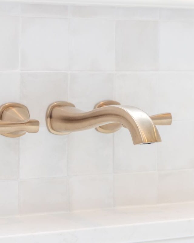 Modern brushed nickel bathroom faucet in Highland Lakes bathroom renovation.